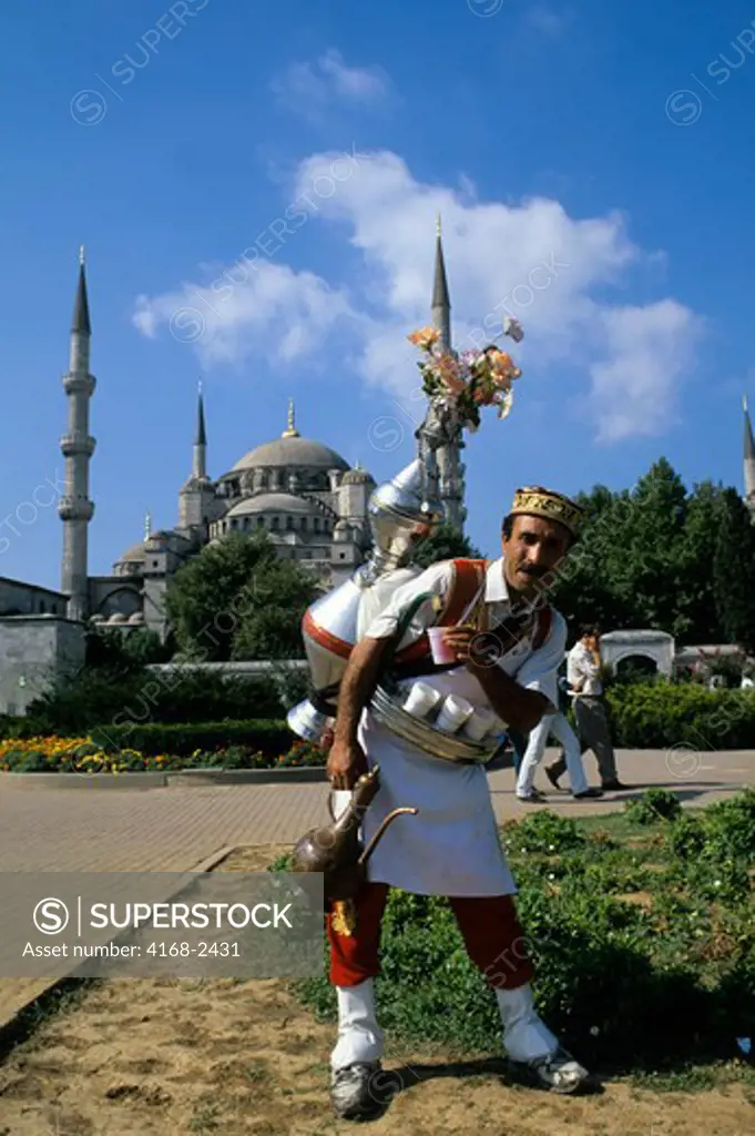 Turkey, Istanbul, Water Bearer, Blue Mosque In Background