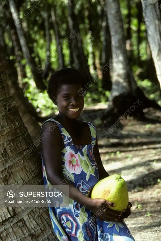 Solomon Islands, Rendova Lagoon, Lubaria Island, Native Girl Leaning On A Coconut Palm Trunk