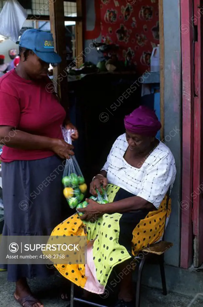 Tobago, Scarborough, Market Scene, Woman Selling Citrus Fruit