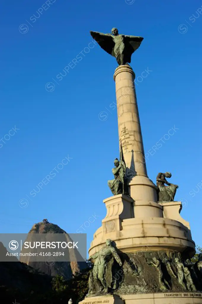 Brazil, Rio De Janeiro, Vermelha Beach, War Memorial With Sugarloaf Mountain In Background