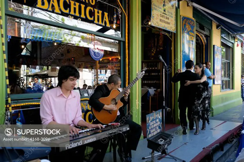 Argentina, Buenos Aires, La Boca, Sidewalk Restaurant/Cafe, Tango Dancers