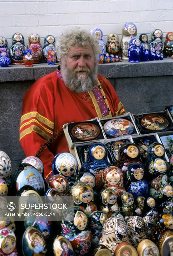 Russia, Moscow, Old Arbat Street, Man Selling Matryoshka Dolls