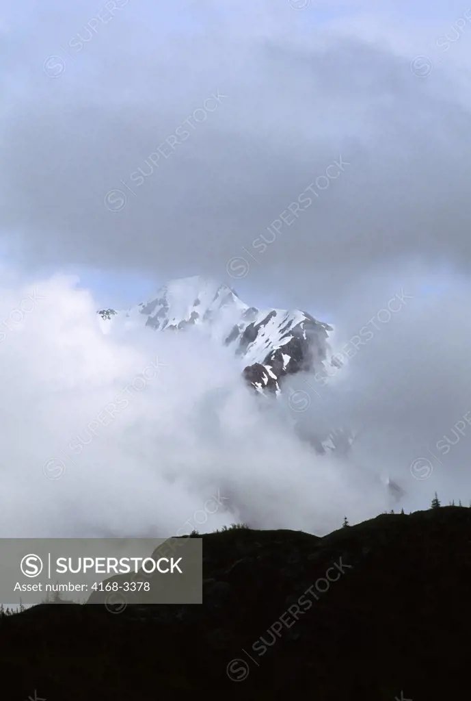 Usa,Alaska,Glacier Bay Np, Mountains Engulfed In Clouds