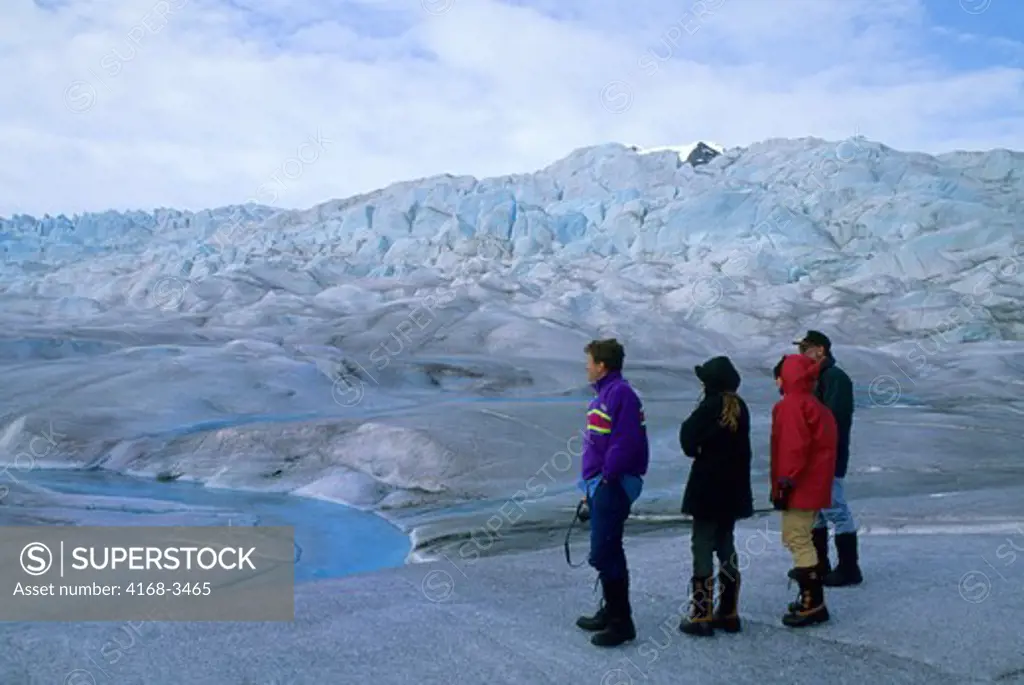 Usa, Alaska, Near Juneau, Mendenhall Glacier, Tourists On Glacier Looking At River On Ice