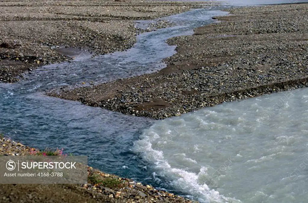 Usa, Alaska, Denali National Park, Confluence Of A Clear Water Creek And A Glacial Fed Creek