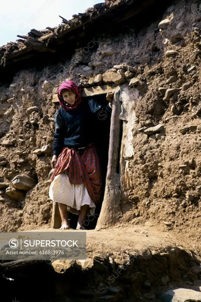 Morocco, Near Marrakech, Asni Valley,Ouirgan Village, Berber Woman In Doorway