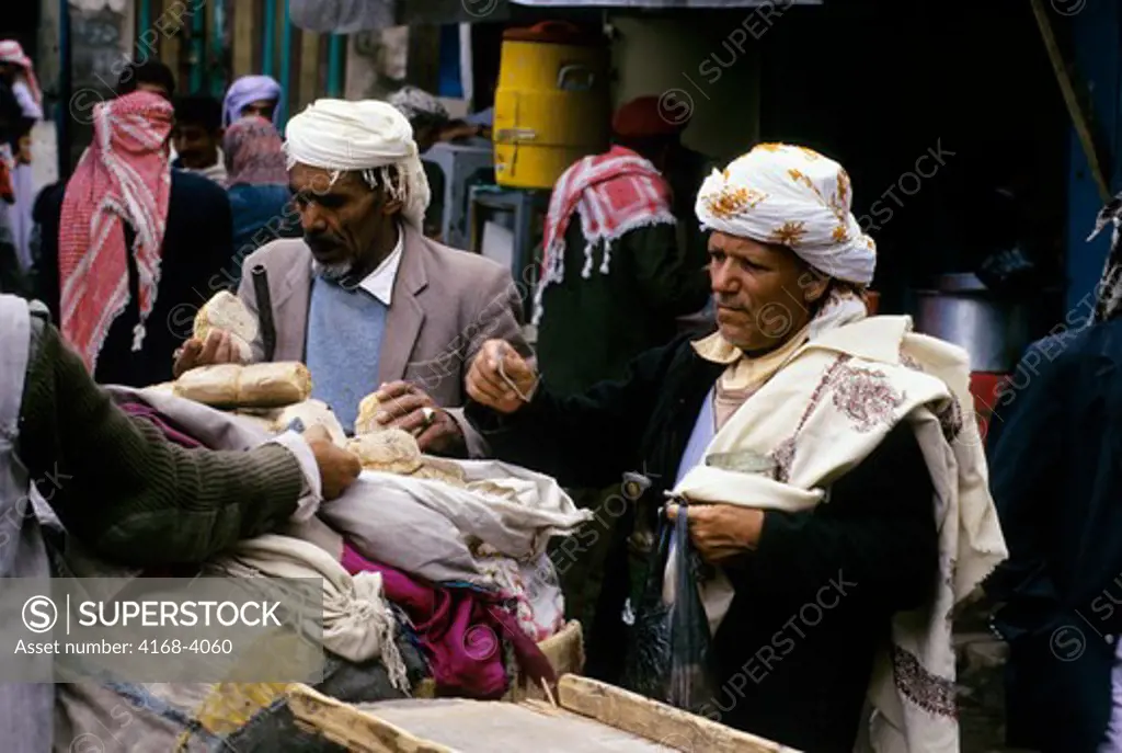 Yemen, Sana'A, Old Town, Souk (Market), Men Buying Bread