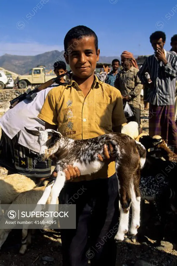 Yemen, Abayn Mountain Area, Village, Sheep Market, Boy With Lamb