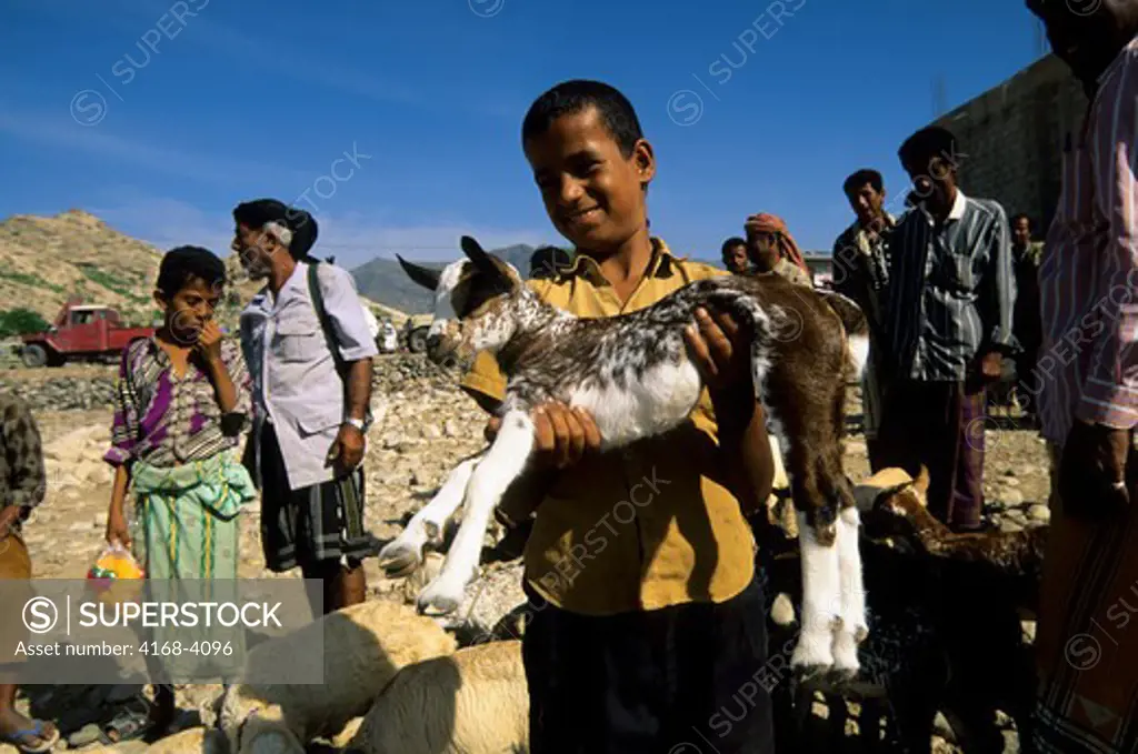 Yemen, Abayn Mountain Area, Village, Sheep Market, Boy With Lamb