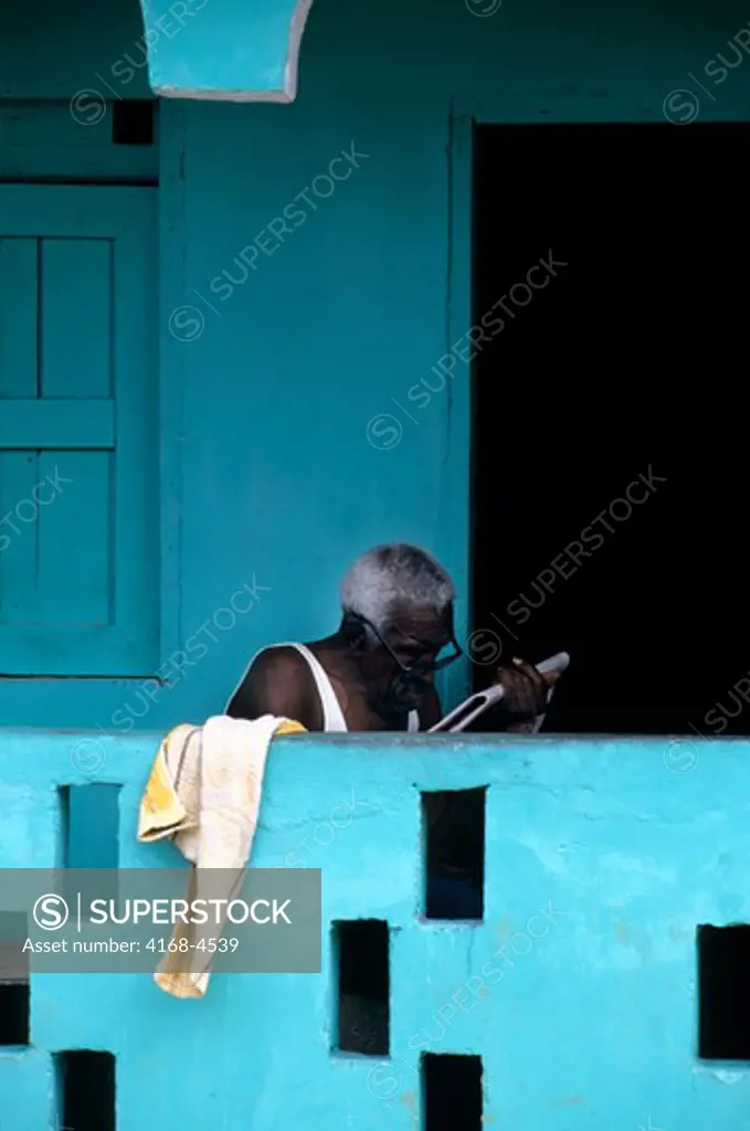 Panama, Portobelo, Street Scene, Old Man Reading Newspaper