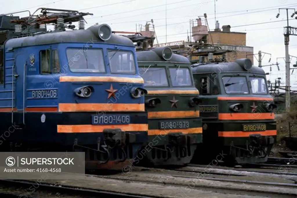 Russia, Siberia, Electric Powered Trains At A Station
