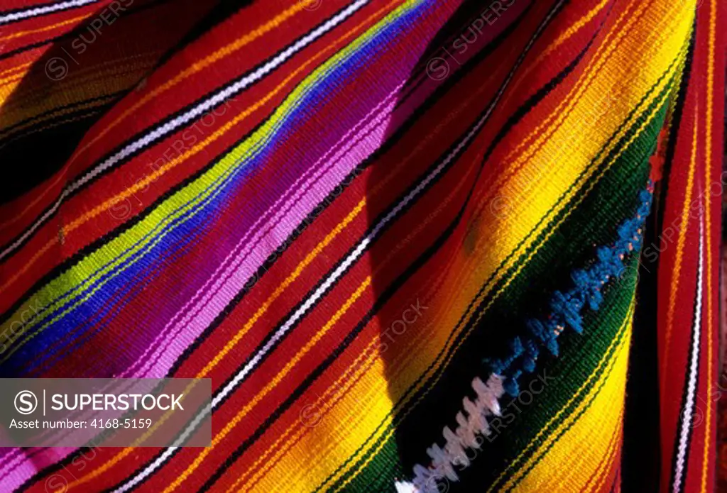honduras, roatan island, coxen's hole, street scene, colorful weavings