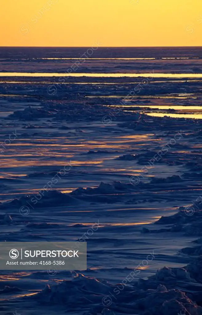 antarctica, weddell sea, pack ice in midnight sunshine, snowdrifts