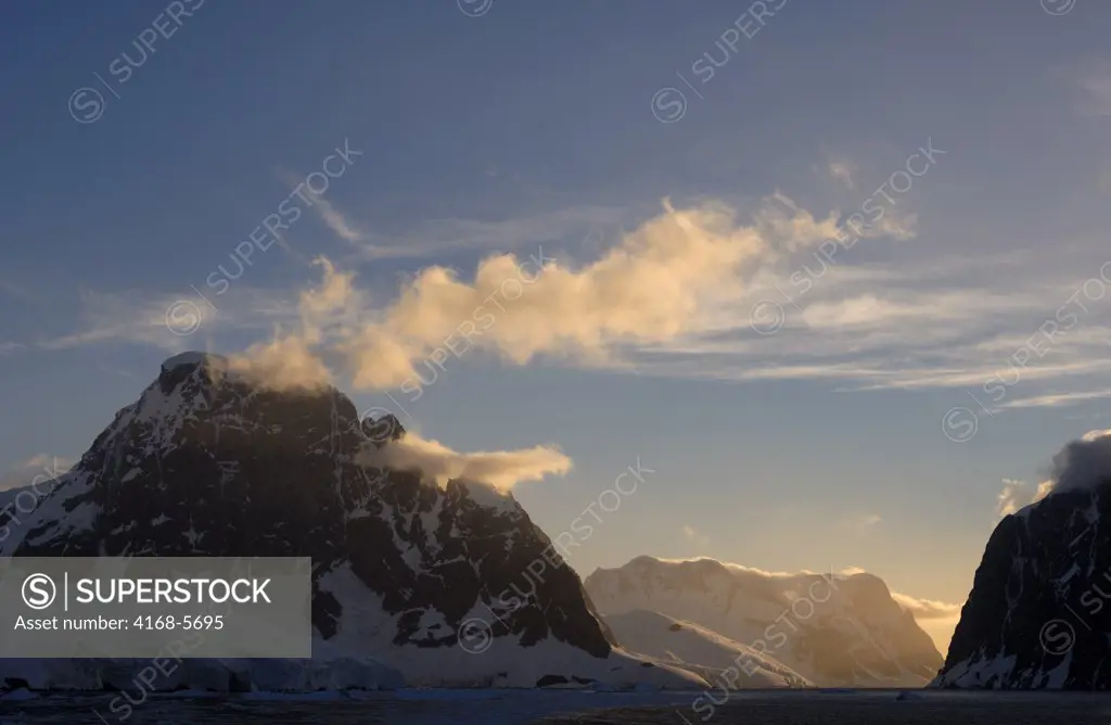ANTARCTICA, ANTARCTIC PENINSULA, VIEW OF LEMAIRE CHANNEL, MOUNTAINS AND GLACIERS IN EVENING LIGHT