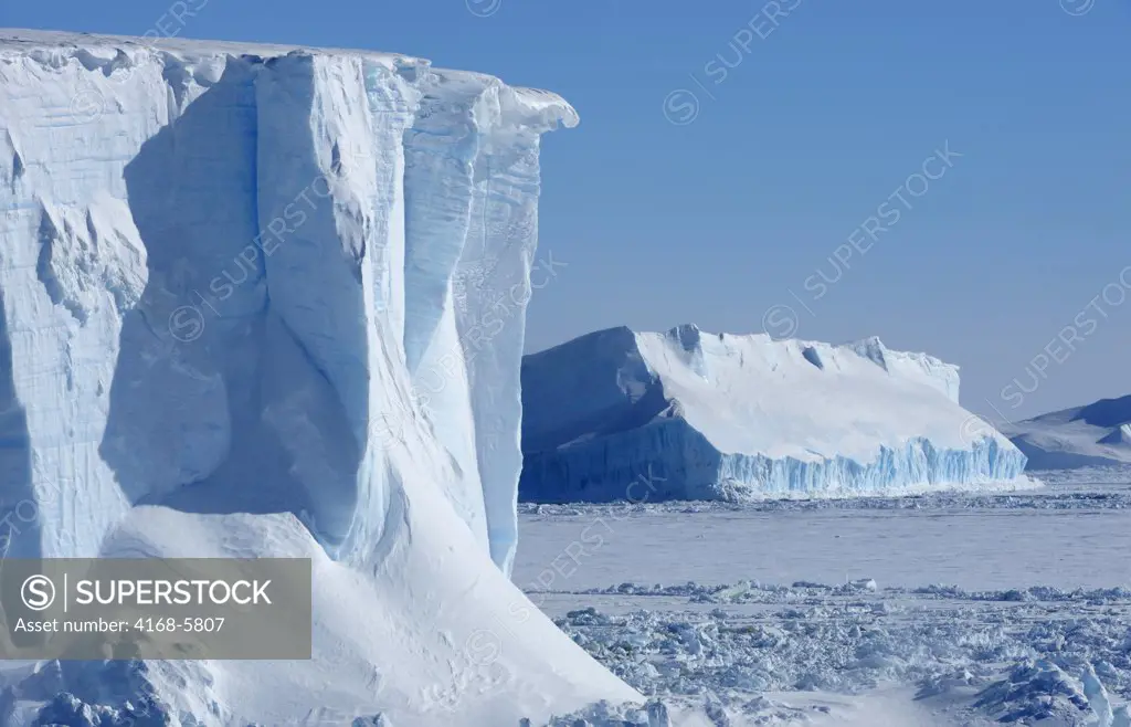 ANTARCTICA, WEDDELL SEA, TABULAR ICEBERG AND PACK ICE
