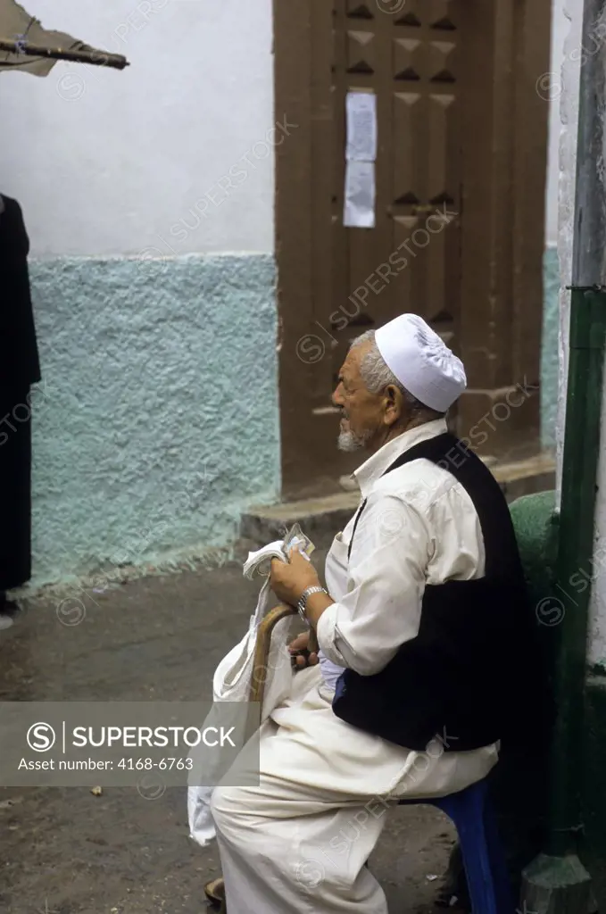 libya, tripoli, old city, bazaar, man selling lottery tickets