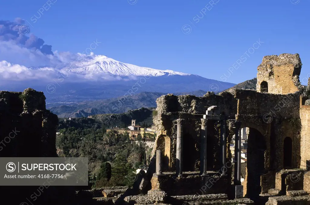 Italy, Sicily, Taormina, Mount Etna erupting from Teatro Greco