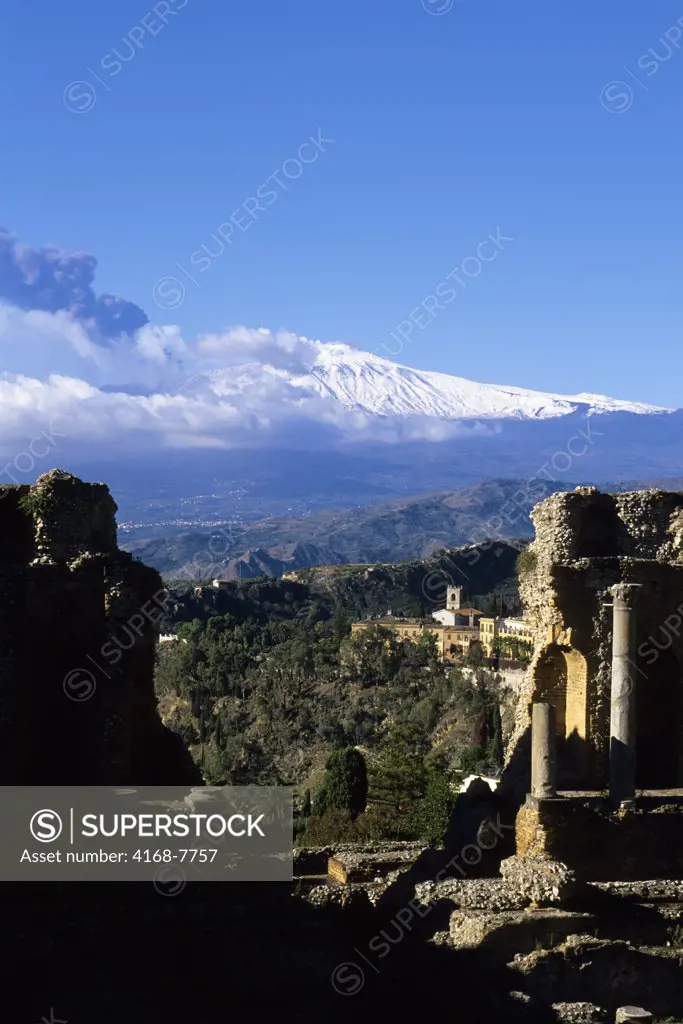 Italy, Sicily, Taormina, Mount Etna erupting from Teatro Greco