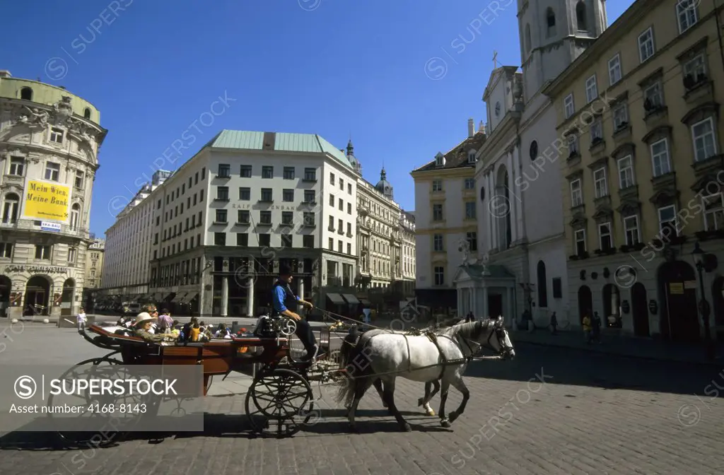 Austria, Vienna, Fiaker crossing St Michael's Square