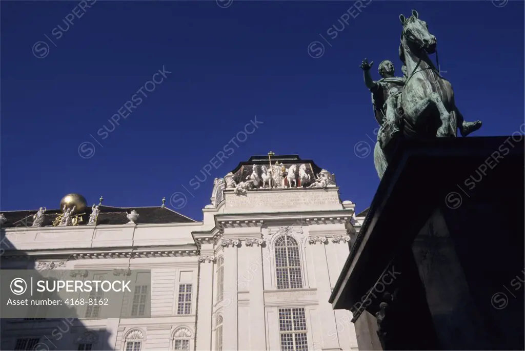 Austria, Vienna, Josefsplatz Austrian National Library with Emperor Josef II monument in foreground