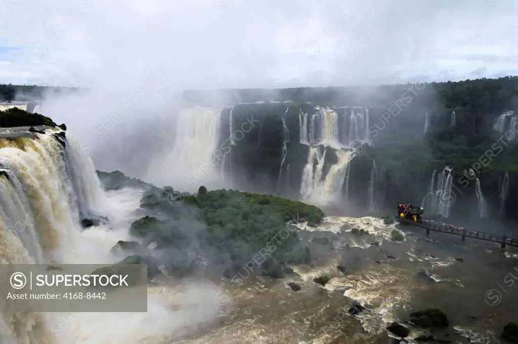 Brazil, Iguassu Falls, tourists on walkway in distance