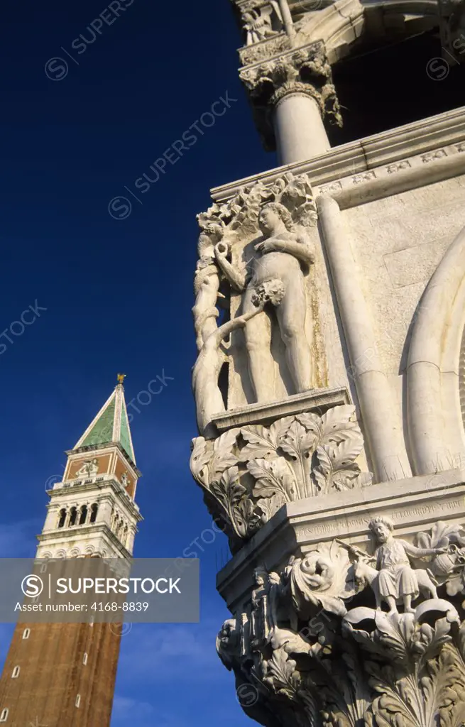 Italy, Venice, Campanile of San Marco and Detail of Palace of Doges