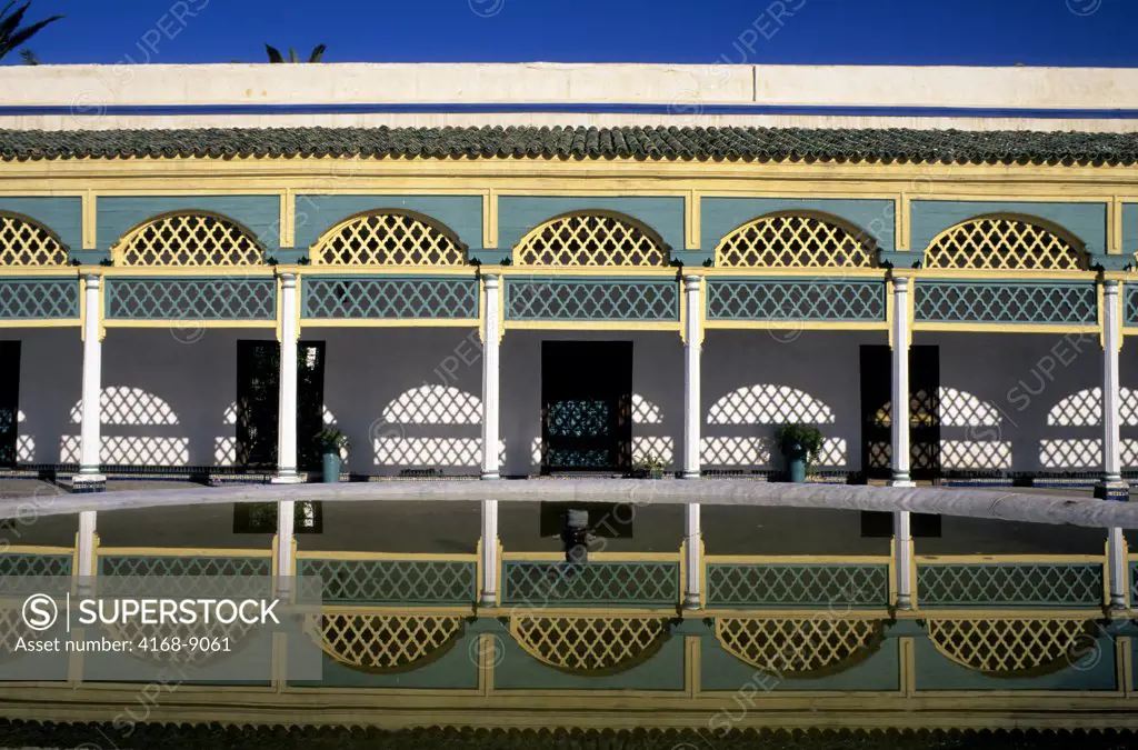 Morocco, Marrakech, Bahia Palace, Building Reflected In Fountain