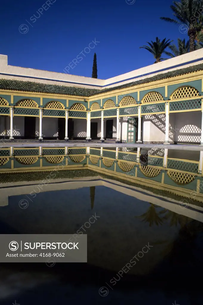 Morocco, Marrakech, Bahia Palace, Building Reflected In Fountain