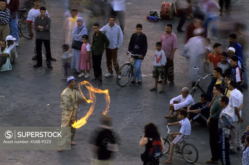 Morocco, Marrakech, City Square, Djemaa El-Fna, Traditional Acrobats, Juggling Fire Torches