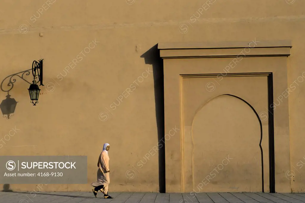 Morocco, Marrakech, Koutoubia Mosque Square, Moroccan Woman, Walking