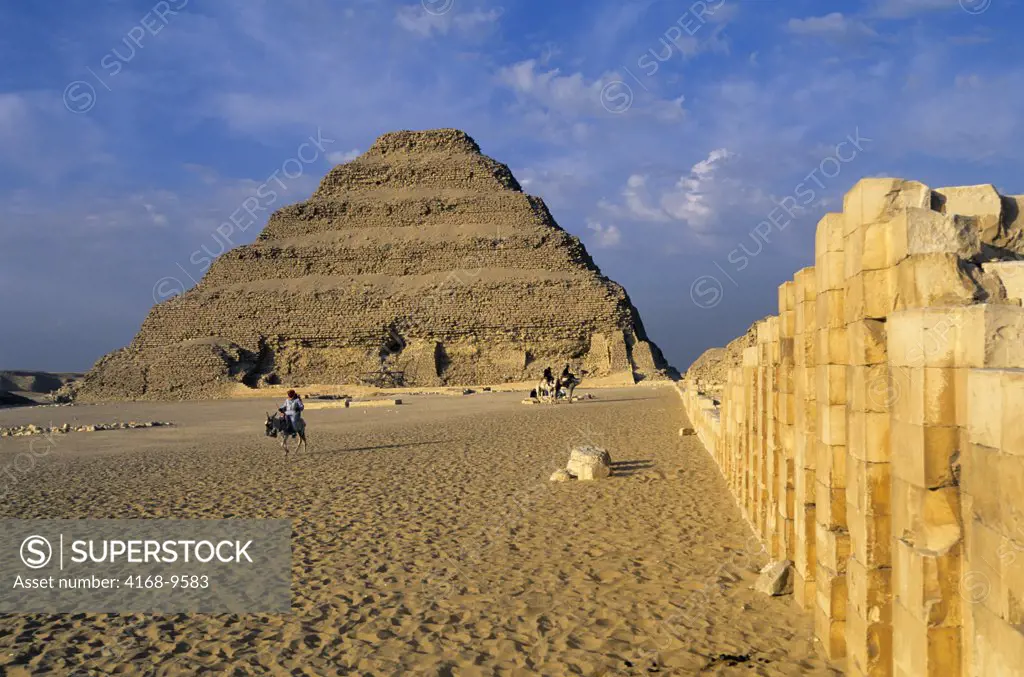 Egypt, Near Cairo, Sakkara, Step Pyramid, 2686 Bc, Man On Donkey