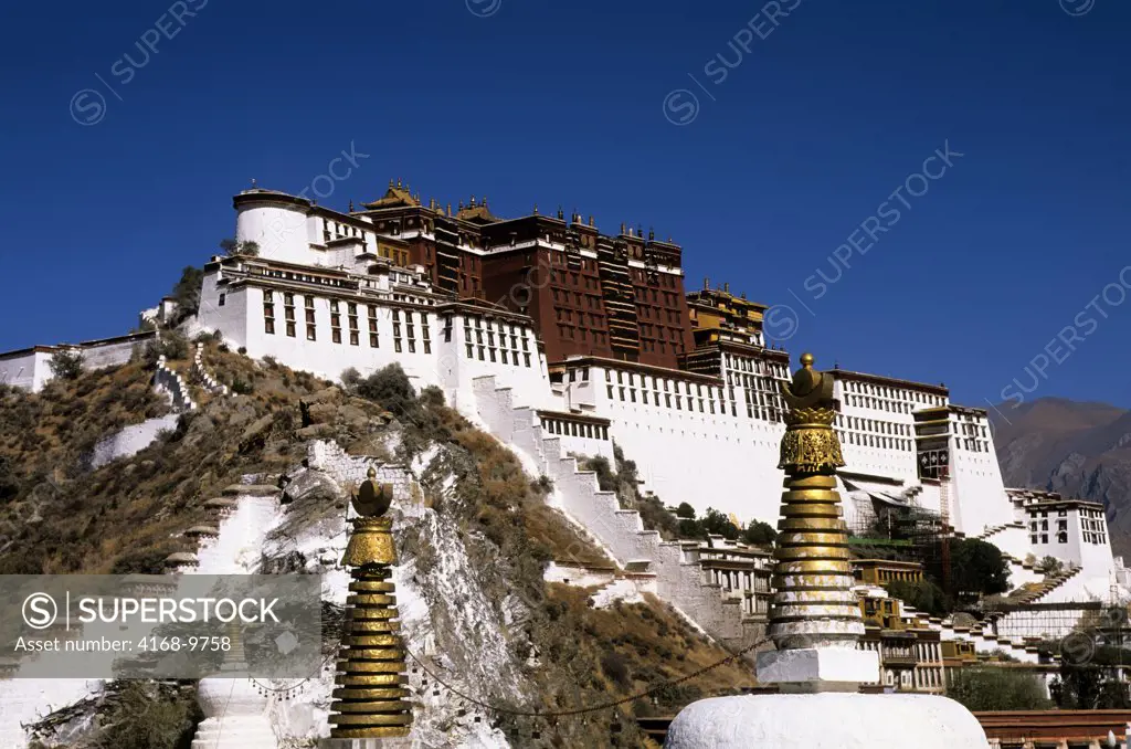 China, Tibet, Lhasa, View Of Potala, Stupas In Foreground