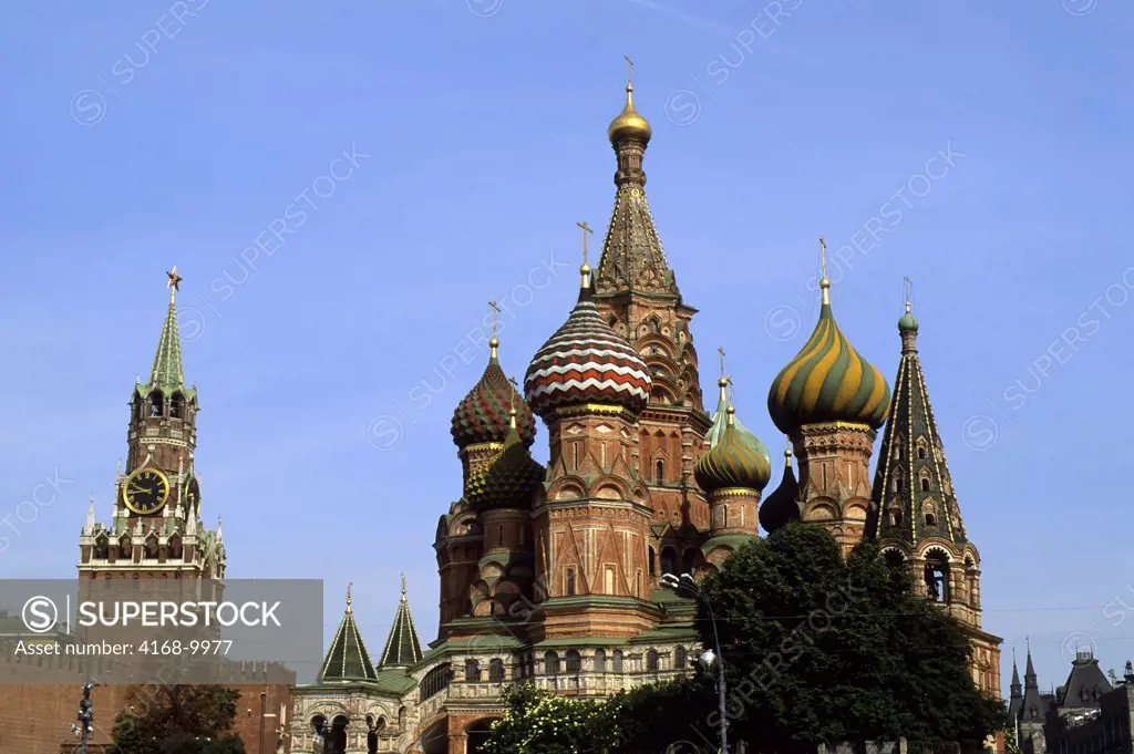 Russia, Moscow, Red Square, St. Basil'S Cathedral With Kremlin Clock Tower