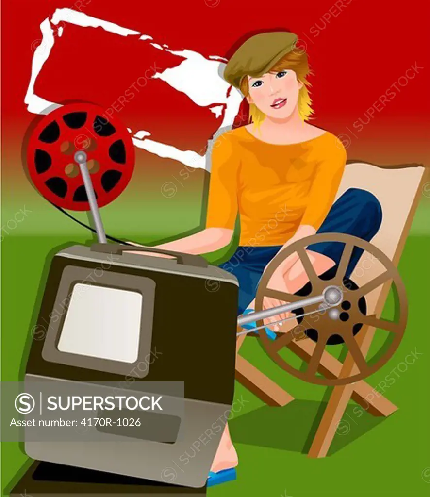 Portrait of a woman sitting in front of a film projector