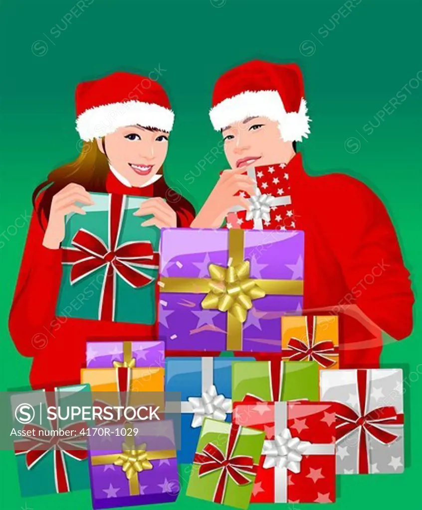 Portrait of a man and a woman holding Christmas presents
