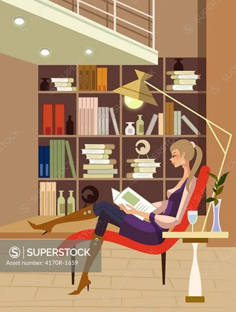 Side profile of a woman sitting on a lounge chair and reading a book