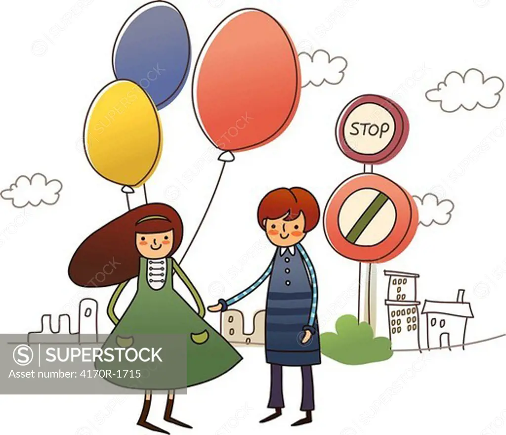 Woman holding balloons with a man standing beside her