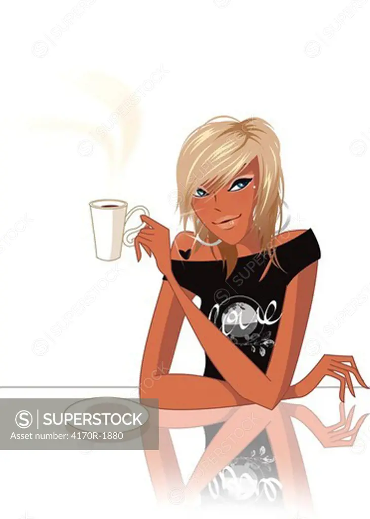 Woman sitting at a table and holding a cup of coffee