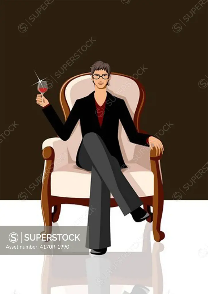 Man sitting in an armchair and holding a glass of red wine
