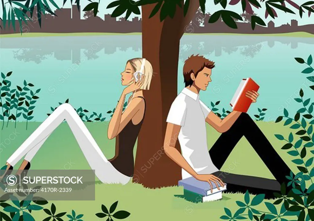 Woman listening music and man reading book under tree
