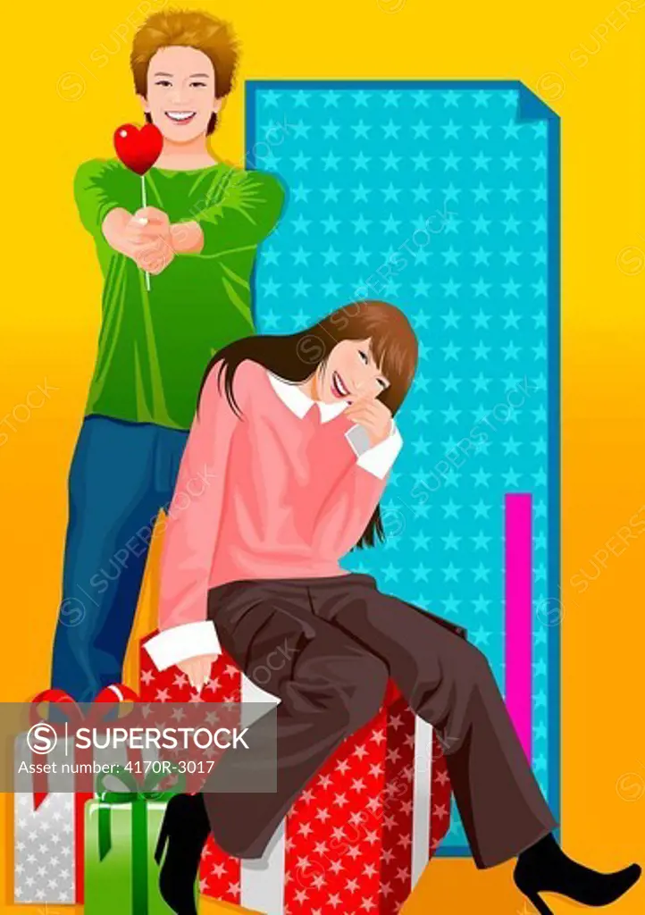 Portrait of a woman sitting on a gift with a man standing behind her and holding a heart shape candy