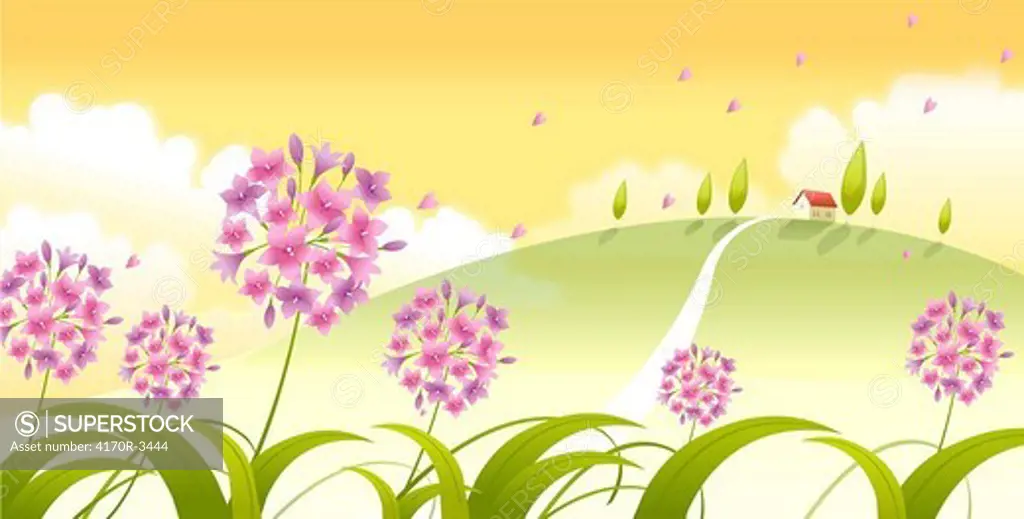 Close-up of flowers with a house and trees on a landscape in the background