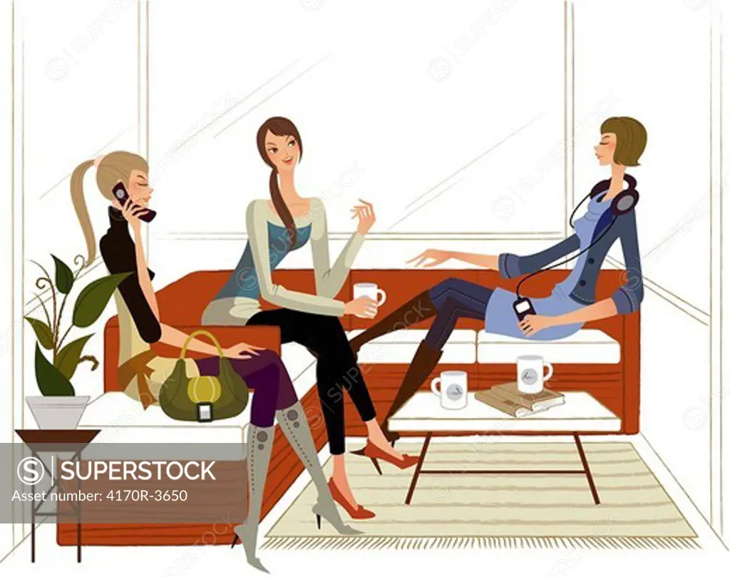 Three women sitting on a couch