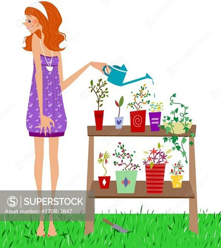 Side profile of a woman watering potted plants