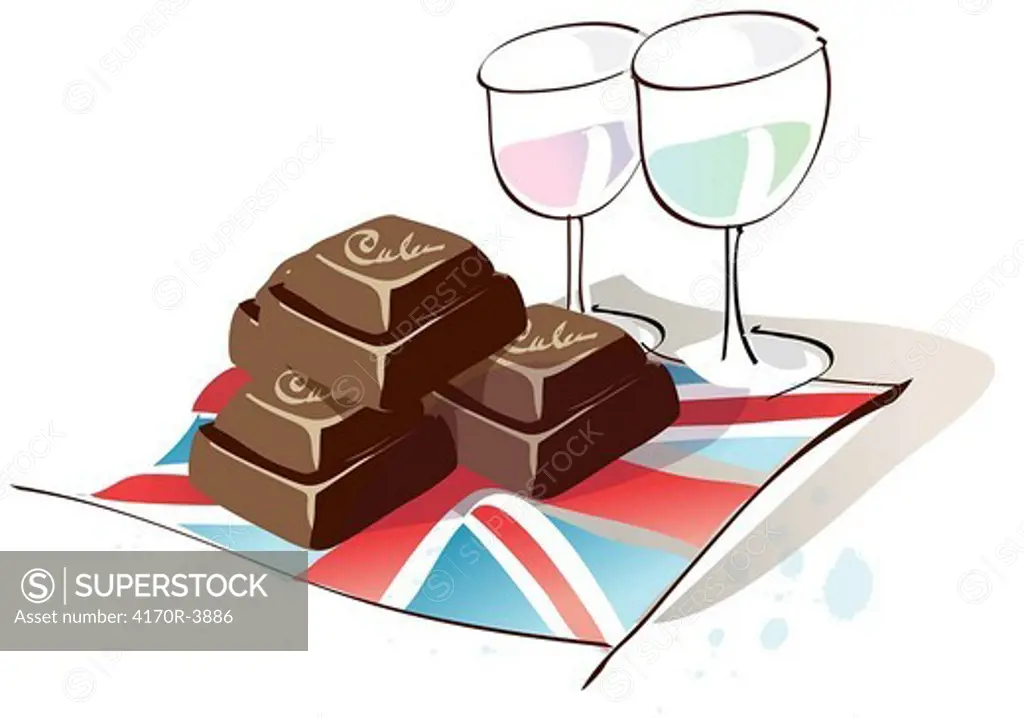 Two glasses of wine with chocolates on a British flag