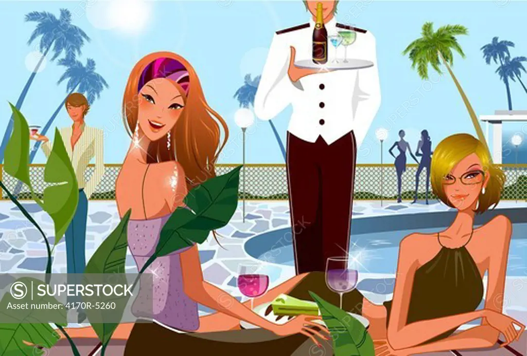 Two women at the poolside with a waiter standing beside them