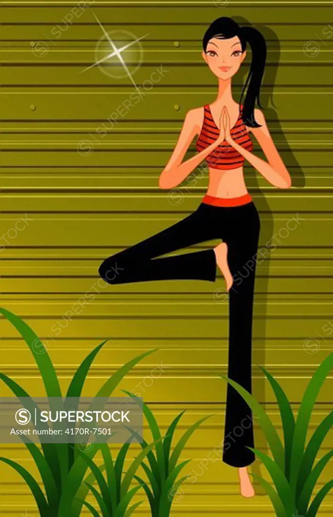 Woman practicing yoga, standing on one leg