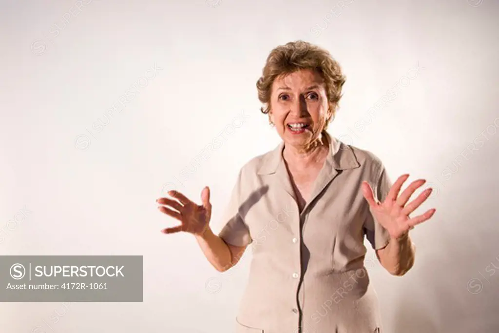 Excited elderly woman with wide grin