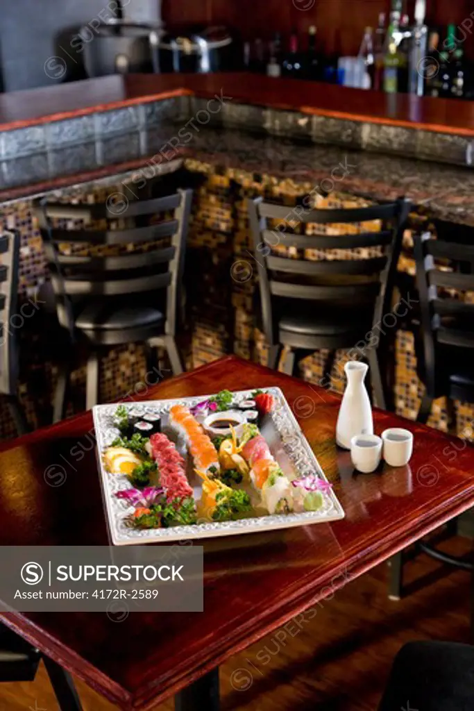 Platter of sushi on table in Japanese restaurant