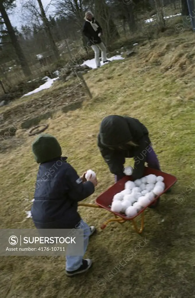 People playing snowballs in early spring. Sweden